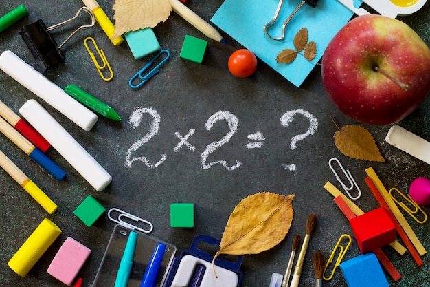 School supplies on a black table