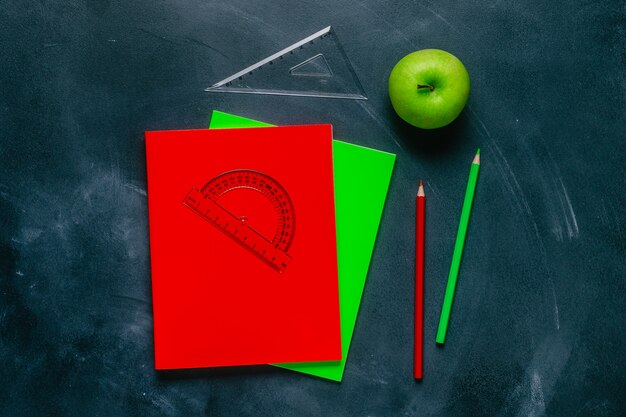 School supplies on a black table