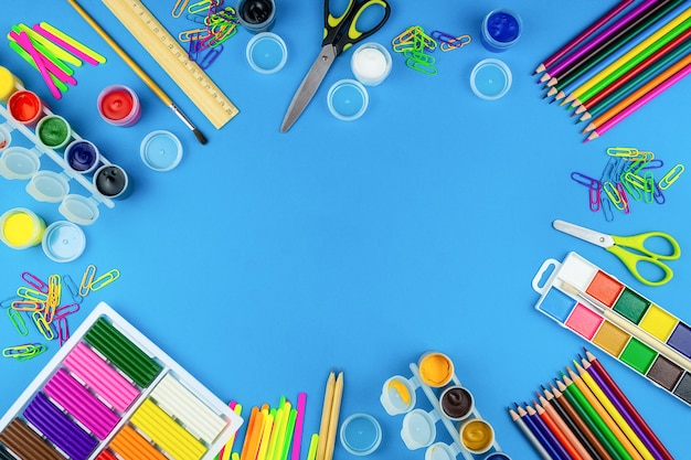 School supplies on a blue background