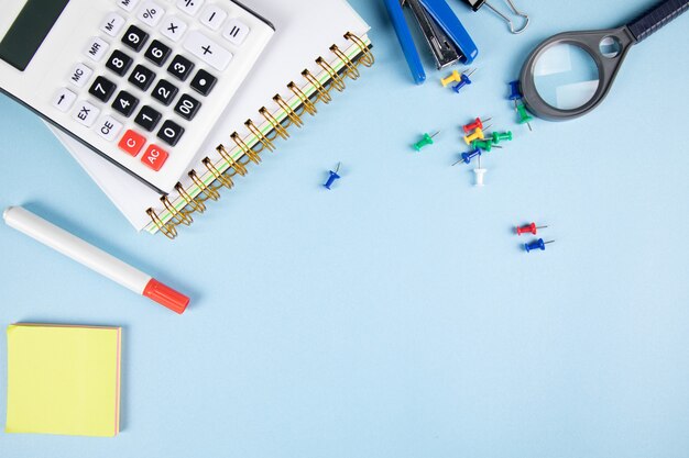 Photo school supplies on the blue table