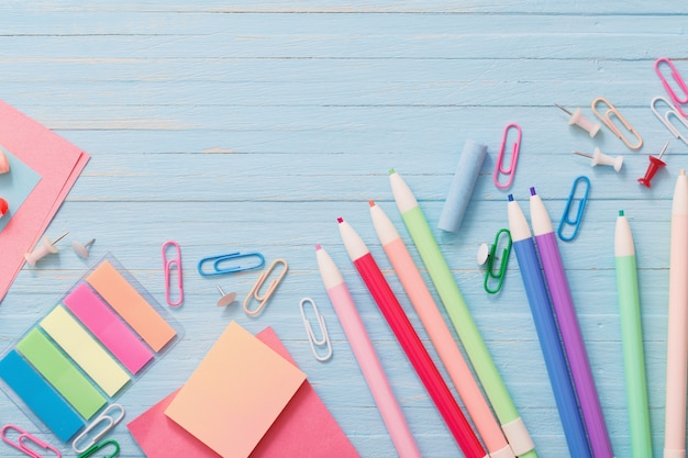 School supplies on blue wood background