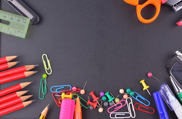 Photo school supplies on chalkboard