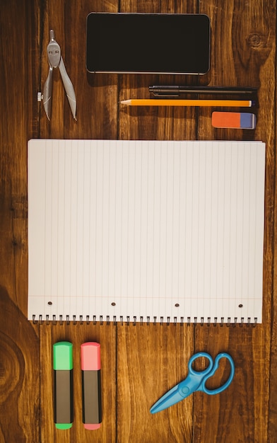 School supplies on desk with copy space