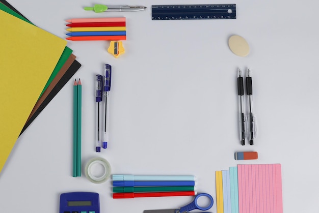 Photo school supplies, empty space in the center