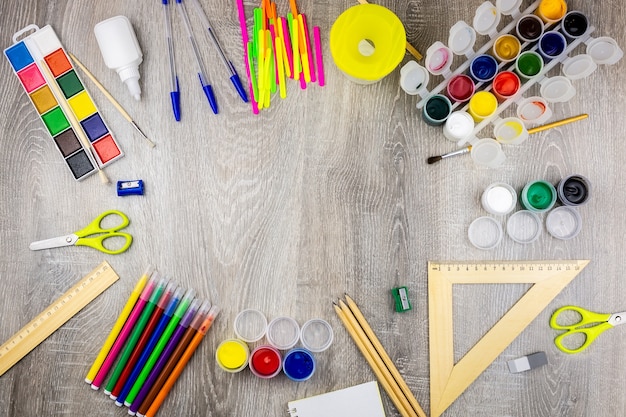 School supplies on a grey background