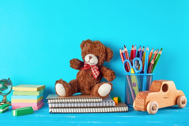 School supplies: notebook, pencils, stickers, scissors 