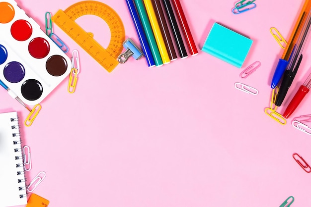 School supplies on a pink background Education Back to school