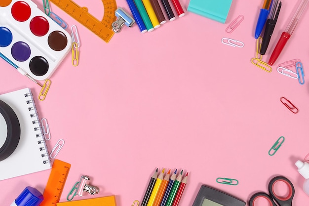 School supplies on a pink background Education Elementary school