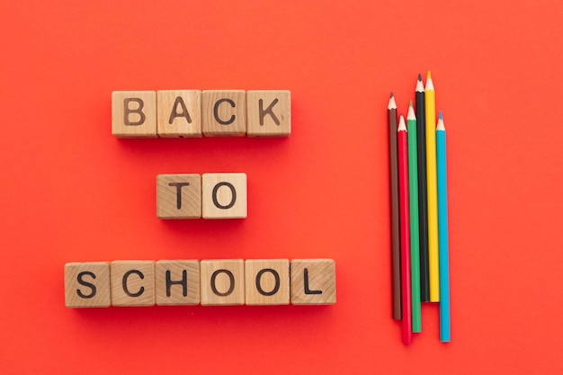 School supplies on red Top view Back to school