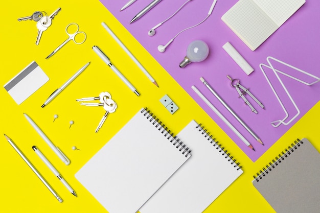 School supplies set at colorful paper