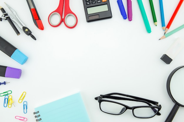 Photo school supplies, stationery accessories on white background