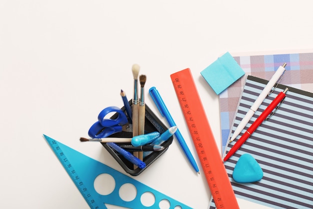 School supplies on a white background