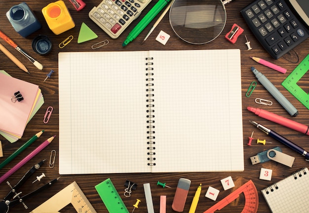 School supplies on wooden background