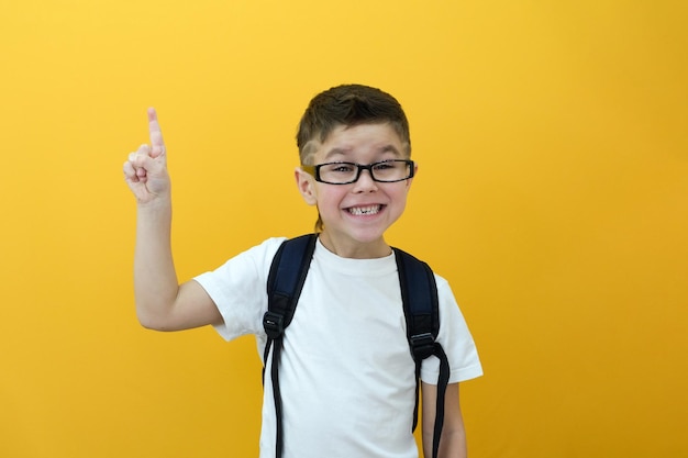 Schoolboy goes back to school Success motivation winner genius concept