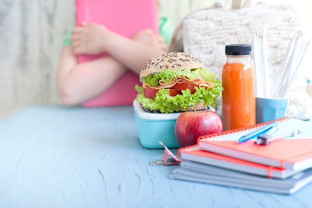 Schoolgirl and lunch.