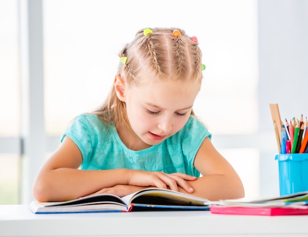 Schoolgirl reading book