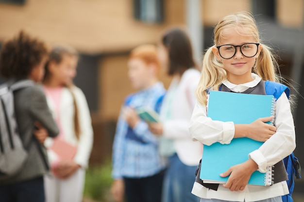 Schoolgirl studying at school