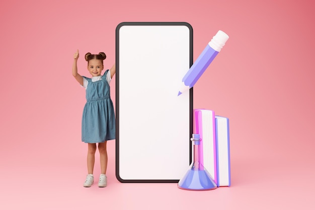 Schoolgirl with big phone gesturing thumbs up on pink background