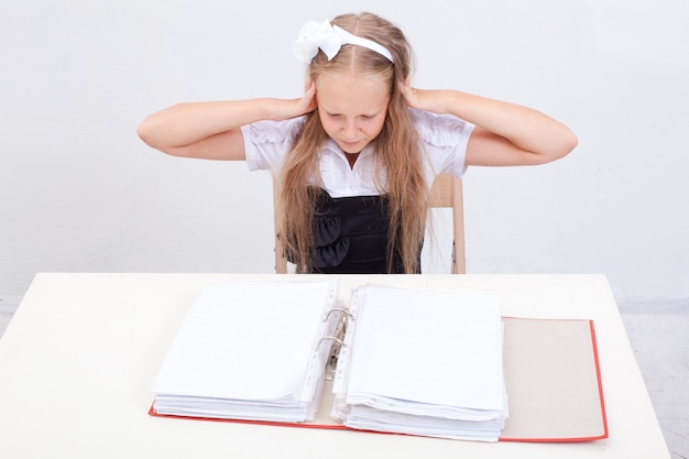 Schoolgirl with folders