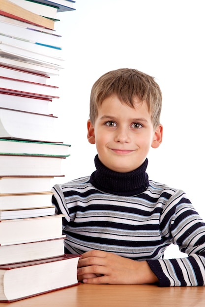 Schooljongen en een hoop boeken