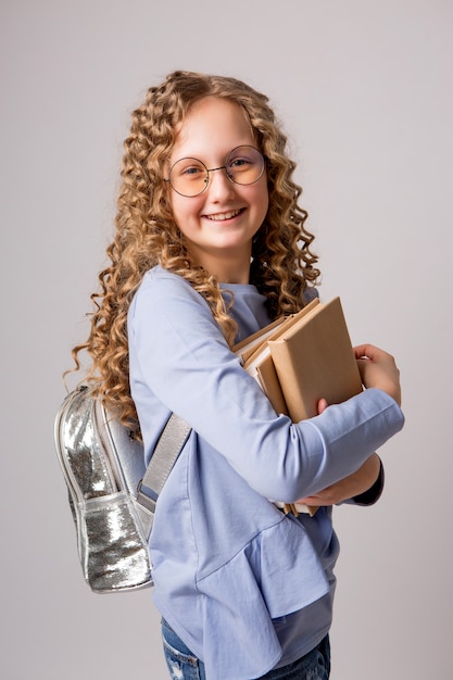 schoolmeisje met boeken