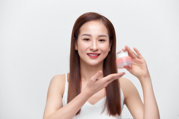 Schoonheid Azië meisje Toon cosmetische make-up en hydraterende voor huidverzorging,