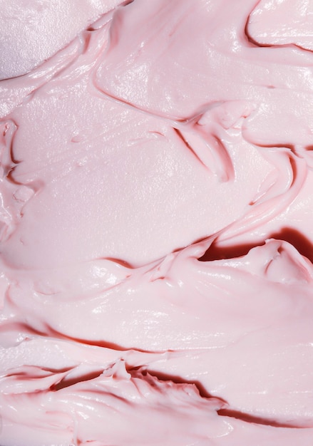 Schoonheid crème textuur achtergrond Roze kleur gezichtscrème lotion vochtinbrengende crème uitstrijkje Huidverzorging cosmetica