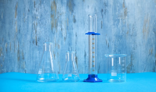 Science glass flasks in chemistry laboratory