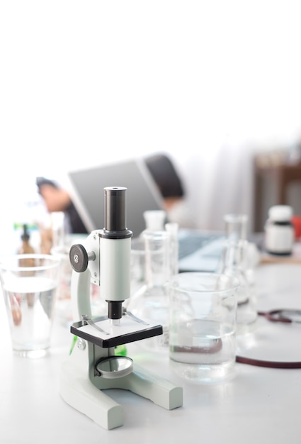 Science microscope laboratory chemical test tube lab glassware equipment. Research and development c