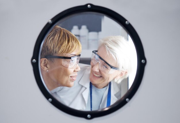 Photo science smile and teamwork with woman doctors in a laboratory together for research or innovation window medical and health with a scientist team working in a lab for an experimental investigation