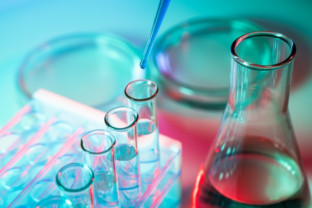 A scientist conducts an experiment in a laboratory. Equipment for chemical experiments.