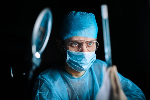 Scientist doctor in the laboratory examines the samples of the virus in vitro vaccine development c