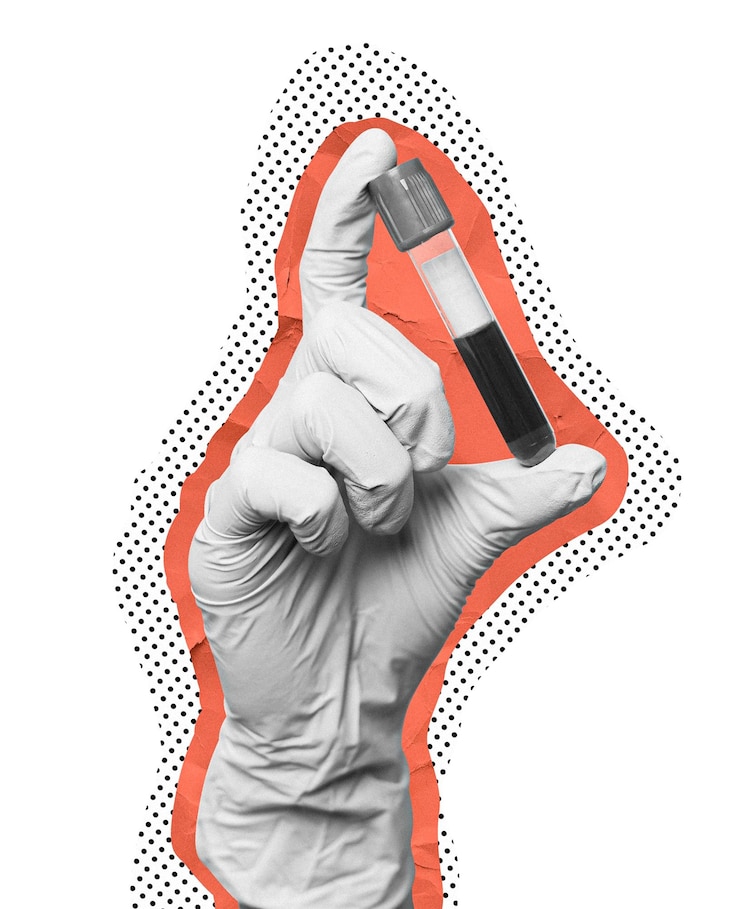 Photo scientist gloved hand holding a blood test tube element