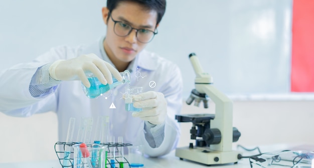 scientist using test tube to pouring into flask to blending liquid solution (with chemistry icon)