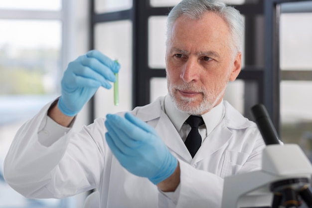 Scientist wearing gloves medium shot