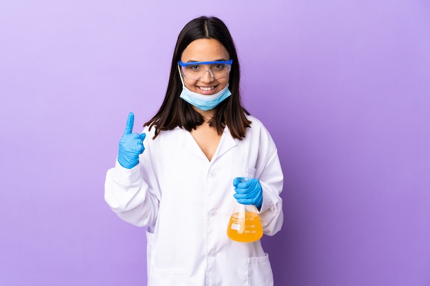 Scientist woman investigating a vaccine to cure disease pointing up a great idea