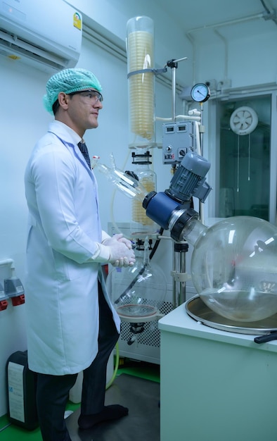 Scientists and assistants are in the machine room extracting oil and cannabis seeds