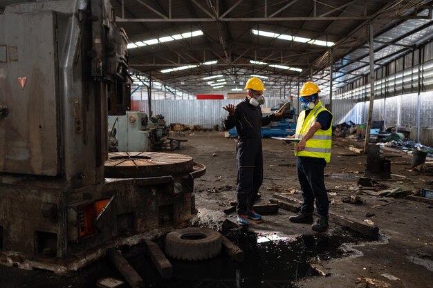 Scientists and government officials Inspect and collect chemical leak samples in industrial sites