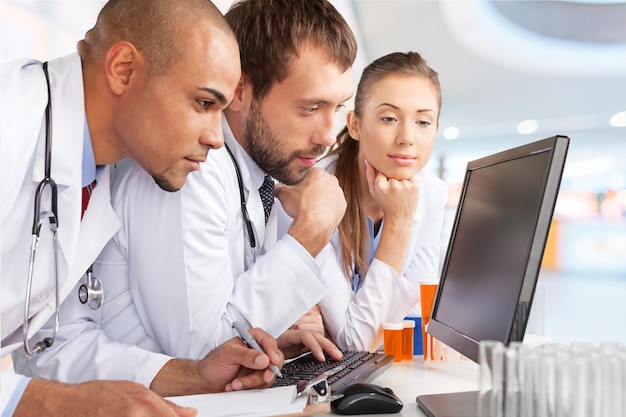 Photo scientists working on computer in the laboratory.