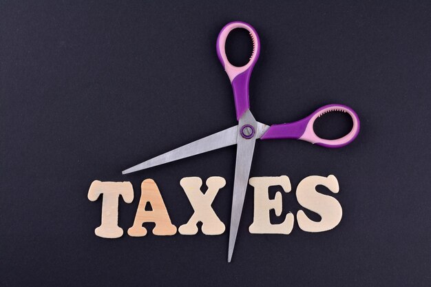 Scissors and the alphabet TAXES