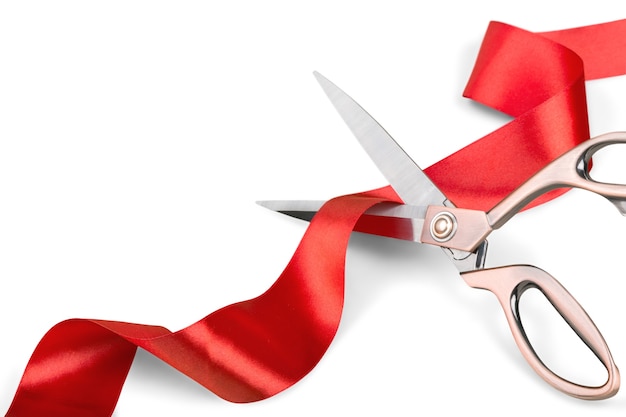 Scissors Cutting Red Ribbon