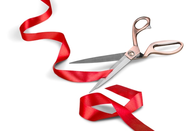 Scissors Cutting Red Ribbon