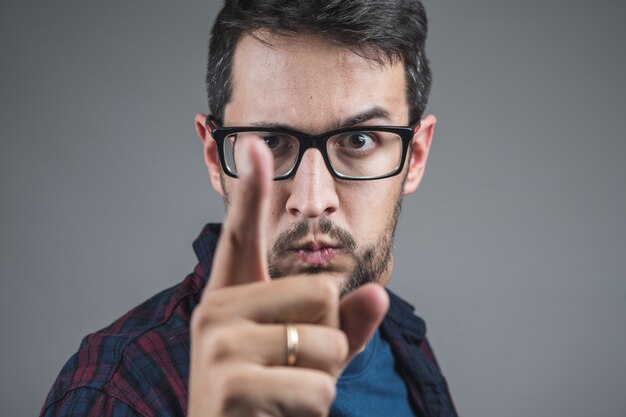 Scolding gesture, pointing with the finger