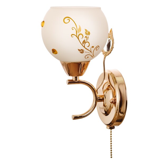 Sconce with a white glass shade with floral ornaments made of golden metal