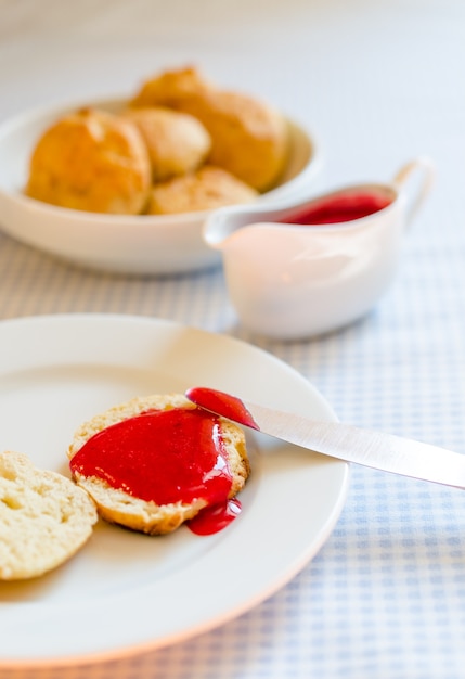 Scone with redcurrant jam