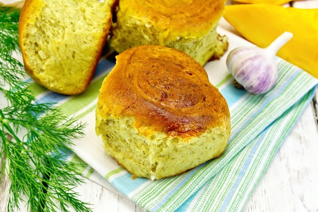 Scones pumpkin with garlic on napkin