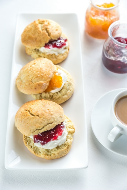 Scones with cream and fruit jam