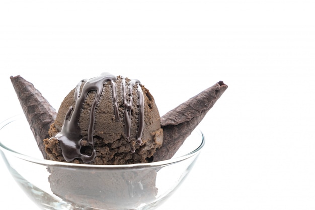 Scoop of chocolated ice cream in glass