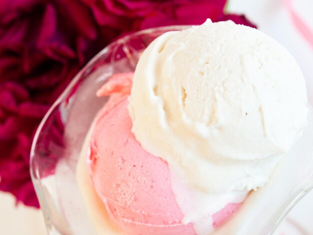 Scoop of delicious Italian fresh ice cream on white background.