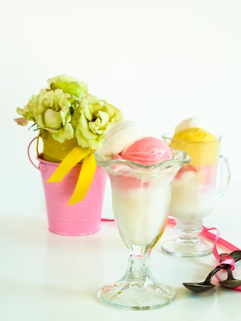 Scoop of delicious Italian fresh ice cream on white background.